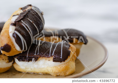 Traditional French dessert on a white plate. Traditional French dessert on a white plate. 43896772