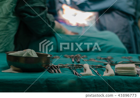 Surgery instruments on the table 43896773
