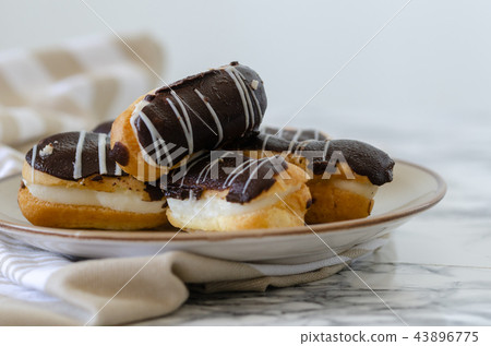 Traditional French dessert on a white plate. Traditional French dessert on a white plate. 43896775