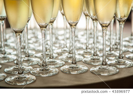 Glasses with cold champagne at the event 43896977
