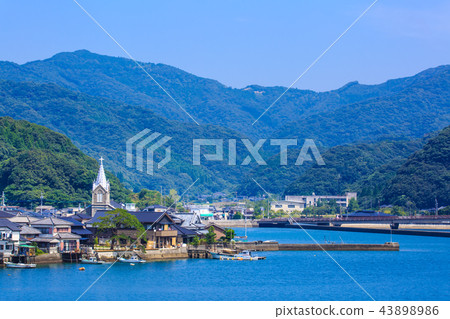 World Heritage site with a view of the Catholic Aizu Church and Aizu village [Amakusa City, Kumamoto Prefecture] 43898986