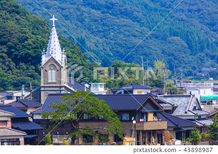 World Heritage site with a view of the Catholic Aizu Church and Aizu village [Amakusa City, Kumamoto Prefecture] 43898987