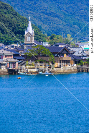 World Heritage site with a view of the Catholic Aizu Church and Aizu village [Amakusa City, Kumamoto Prefecture] 43898993