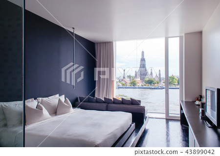 Bedroom with black wall white bed, Wat Arun view 43899042