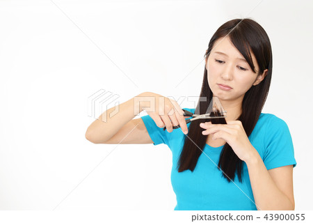Women suffering from damage hair Women suffering from damage hair 43900055