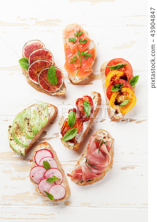 Brushetta or traditional spanish tapas Brushetta or traditional spanish tapas 43904847
