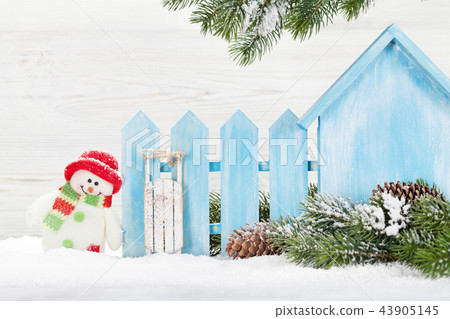 Christmas snowman and sledge toys and fir tree Christmas snowman and sledge toys and fir tree 43905145