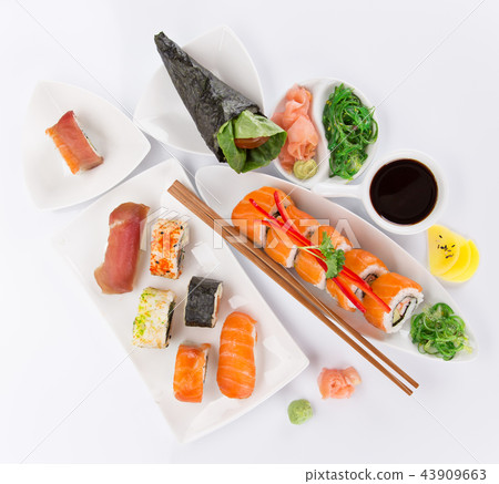 Japanese sushi set on white background. Japanese sushi set on white background. 43909663