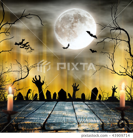 Spooky Halloween background with zombie hands. 43909714