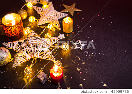 Christmas decoration on black stone background Christmas decoration on black stone background 43909786