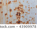 Rusty metal background with streaks of rust.  43909978