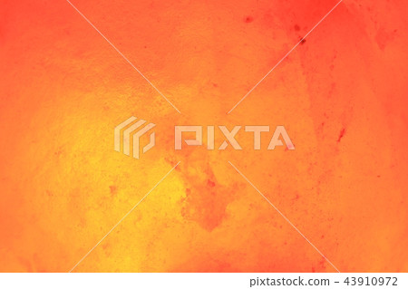 Close-up rock salt lamp that emits meditative light 43910972