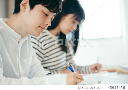 Two people taking classes side by side 43913456