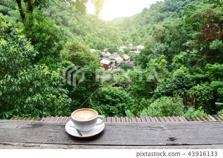 morning coffee on the wooden balcony in the hidden morning coffee on the wooden balcony in the hidden 43916133