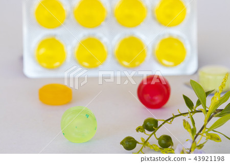 cough sore throat pastille colorful on white 43921198