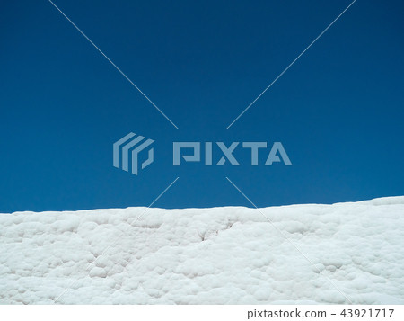 Natural travertine pools and terraces in Pamukkale. Cotton castle in southwestern Turkey Natural travertine pools and terraces in Pamukkale. Cotton castle in southwestern Turkey 43921717