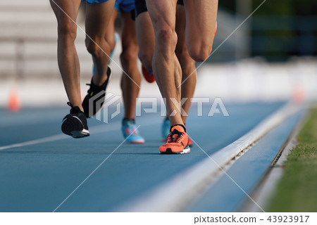 Athletics people running on the track field Athletics people running on the track field 43923917