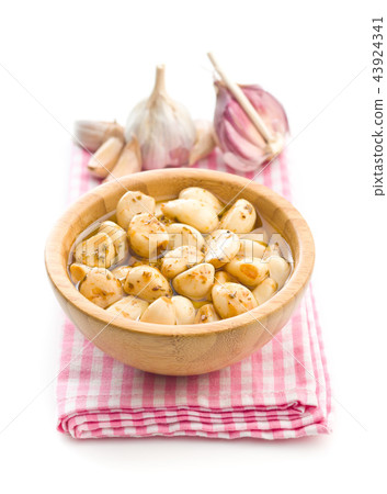 Marinated garlic. Pickled garlic. Marinated garlic. Pickled garlic. 43924341