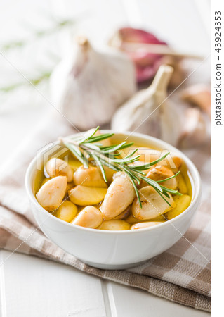 Marinated garlic. Pickled garlic. Marinated garlic. Pickled garlic. 43924353