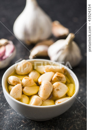 Marinated garlic. Pickled garlic. Marinated garlic. Pickled garlic. 43924354