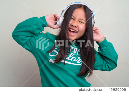 Portrait of young cute Asian girl wearing stylish clothes 43929906