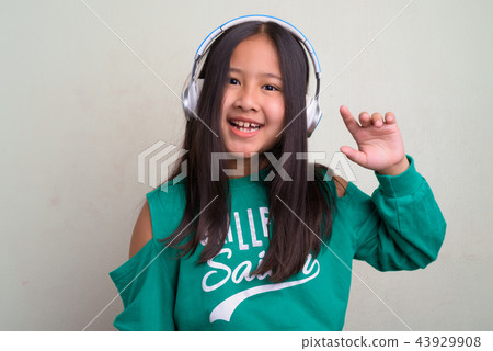 Portrait of young cute Asian girl wearing stylish clothes 43929908