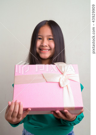Portrait of young cute Asian girl wearing stylish clothes 43929909