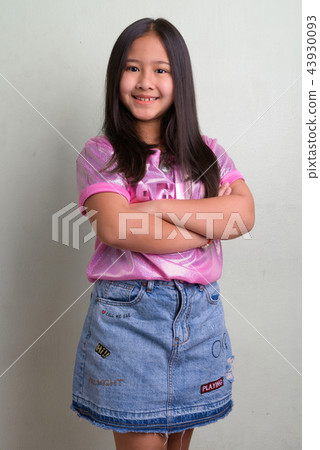 Portrait of young cute Asian girl wearing stylish clothes Portrait of young cute Asian girl wearing stylish clothes 43930093
