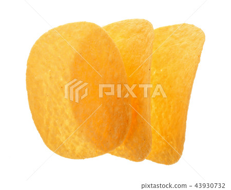 three potato chips on white background close-up. Top view. Flat lay three potato chips on white background close-up. Top view. Flat lay 43930732