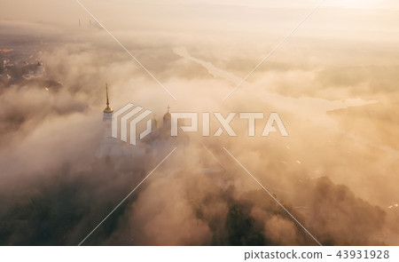 An incredibly beautiful misty morning over Vladimir. Aerial view on Assumption Cathedral in the fog An incredibly beautiful misty morning over Vladimir. Aerial view on Assumption Cathedral in the fog 43931928