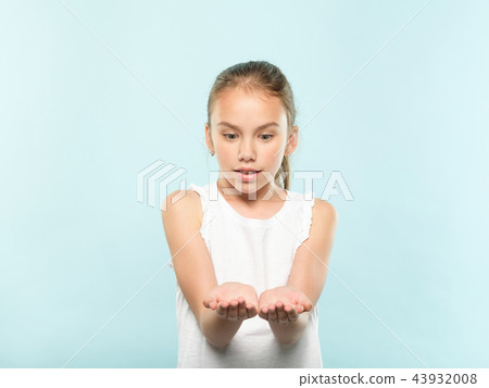 enchanted girl holding hand empty advertisement 43932008