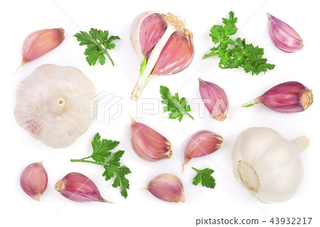 garlic with parsley leaves isolated on white background. Top view. Flat lay pattern garlic with parsley leaves isolated on white background. Top view. Flat lay pattern 43932217
