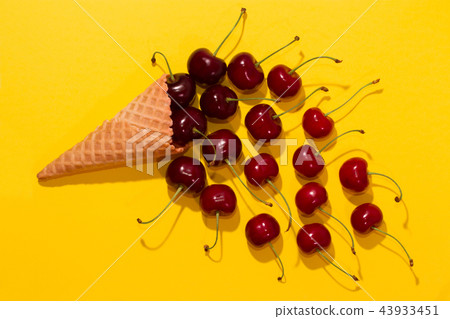 Bright ripe strawberry on a pastel background. Bright ripe strawberry on a pastel background. 43933451