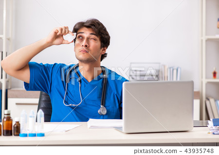 Young doctor working in the hospital 43935748