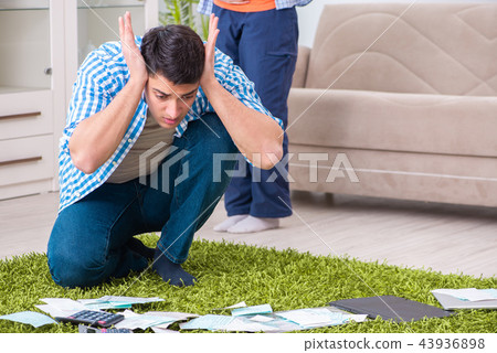 Young family in budget planning concept Young family in budget planning concept 43936898
