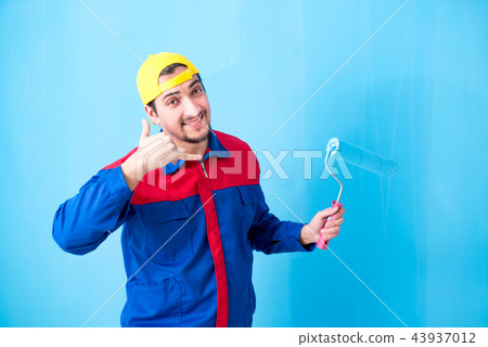 Young painter doing renovation at home Young painter doing renovation at home 43937012