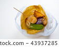 Hong Kong street snack in a take-away bag 43937285