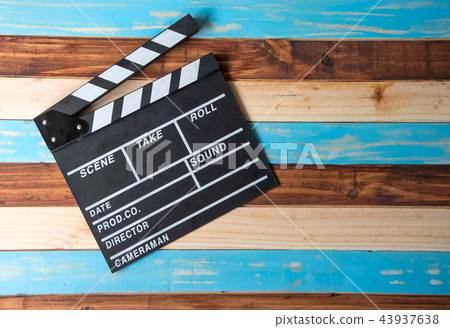 Slate for cut film placed on wooden floor. 43937638