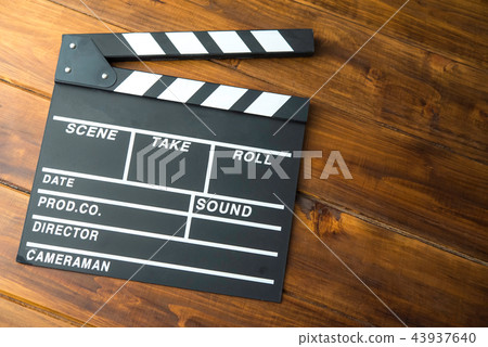 Slate for cut film placed on wooden floor. 43937640