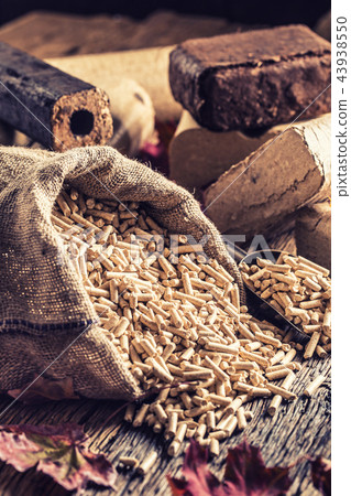 Wooden pressed pellets and briquettes from biomass 43938550