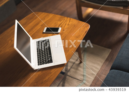 laptop on desk laptop on desk 43939319