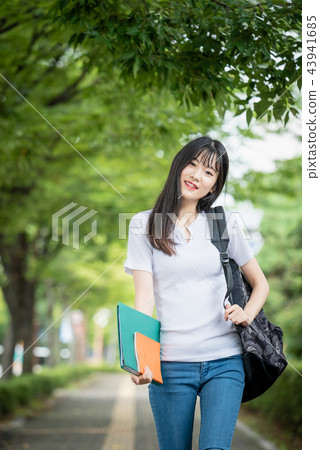College student campus young female woman College student campus young female woman 43941685