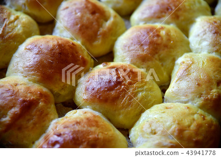 tasty homemade buns on baking sheet tasty homemade buns on baking sheet 43941778