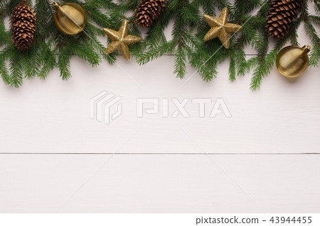 Christmas background with fir tree and decoration Christmas background with fir tree and decoration 43944455