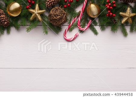 Christmas background with fir tree and decoration Christmas background with fir tree and decoration 43944458