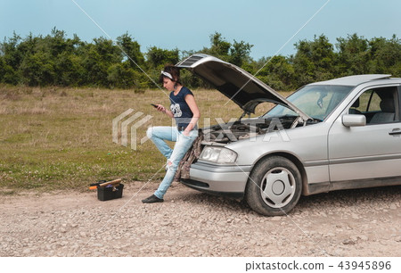 Fashion woman having troubles with the car Fashion woman having troubles with the car 43945896