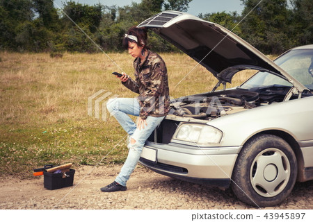 Fashion woman having troubles with the car Fashion woman having troubles with the car 43945897