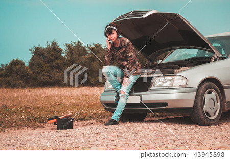 Fashion woman having troubles with the car Fashion woman having troubles with the car 43945898