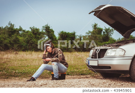 Fashion woman having troubles with the car Fashion woman having troubles with the car 43945901