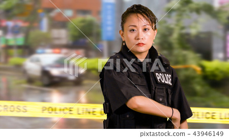 Asian American Police Officer at Crime scene  43946149